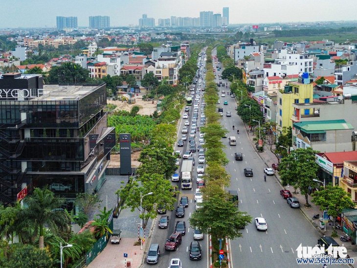 Dân hối hả trở lại Hà Nội dù chưa hết nghỉ Tết， cửa ngõ kẹt cứng - Ảnh 14.